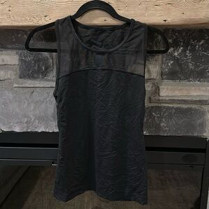 Black mesh tank top. No pilling, great condition!